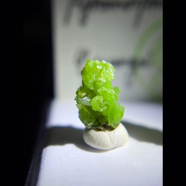 Two bright green pyromorphite clusters from Guilin — alternate view