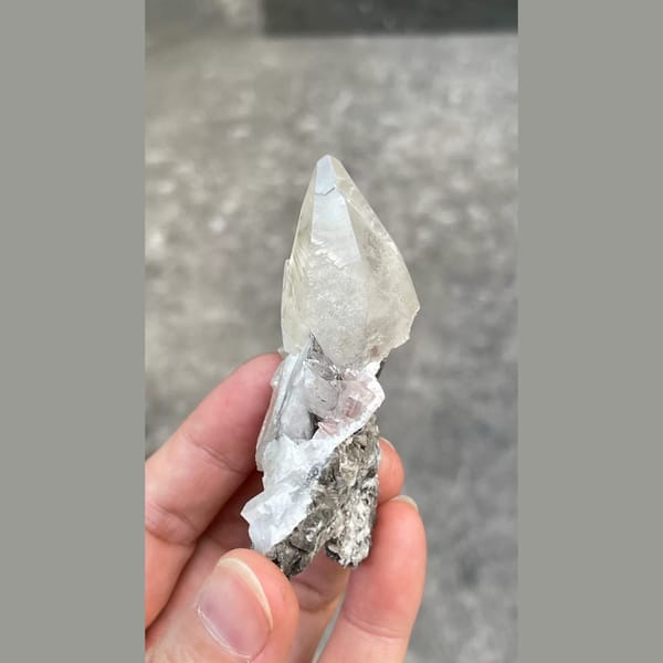 Lamp wick calcite with red fluorescence from Shimen — alternate view