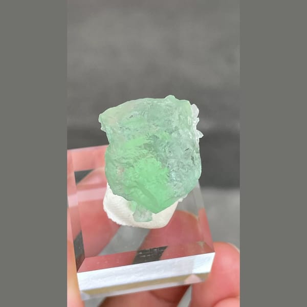 Etched candy-green fluorite with calcite from Fujian — detail view