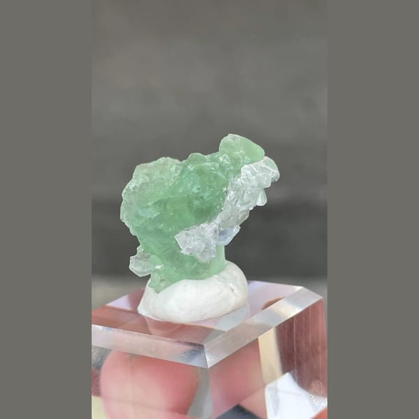 Etched candy-green fluorite with calcite from Fujian — detail view