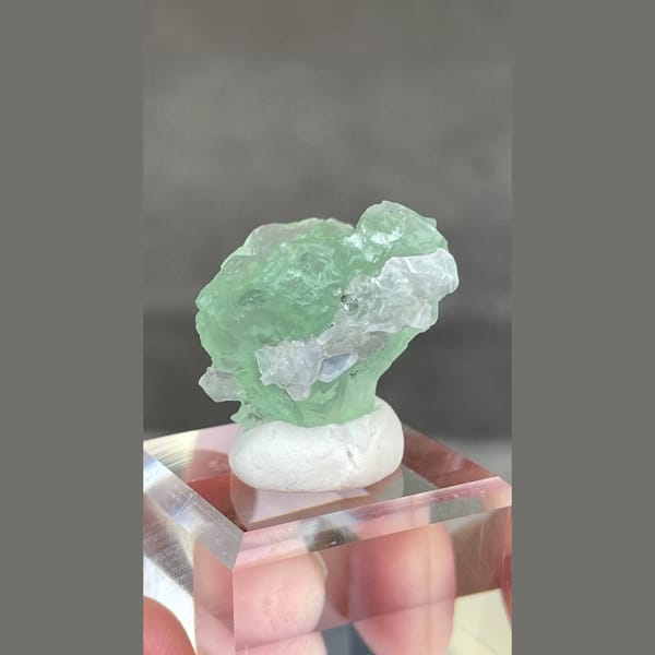 Etched candy-green fluorite with calcite from Fujian — detail view
