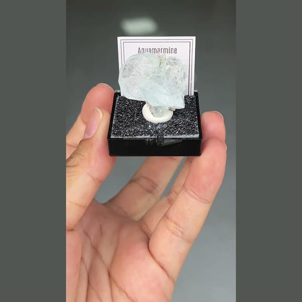 Pale blue aquamarine crystals from Xuebaoding, Sichuan — complete view