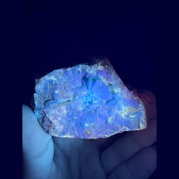 Sky blue fluorescent gibbsite with gearksutite from Qinglong — alternate view
