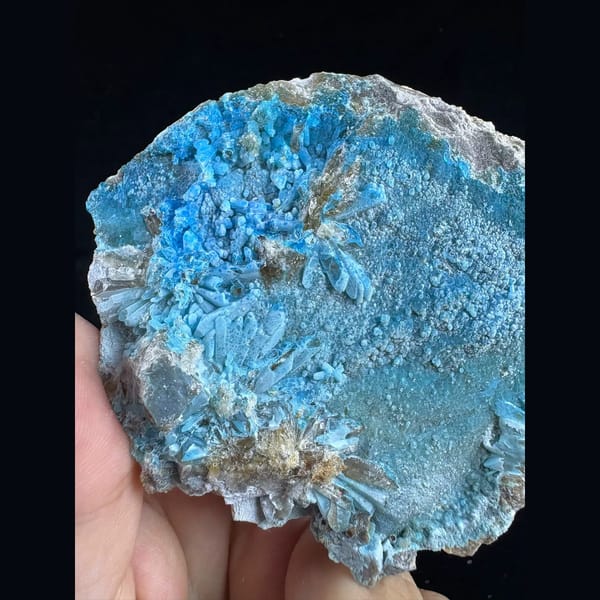 Large sky-blue fluorescent gibbsite from Qinglong — complete view