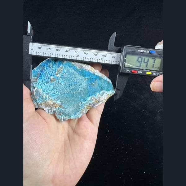 Large sky-blue fluorescent gibbsite from Qinglong — alternate view