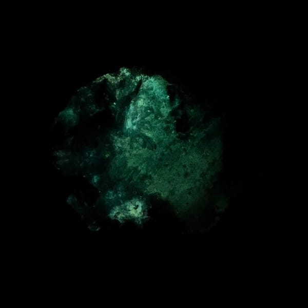 Large sky-blue fluorescent gibbsite from Qinglong — detail view