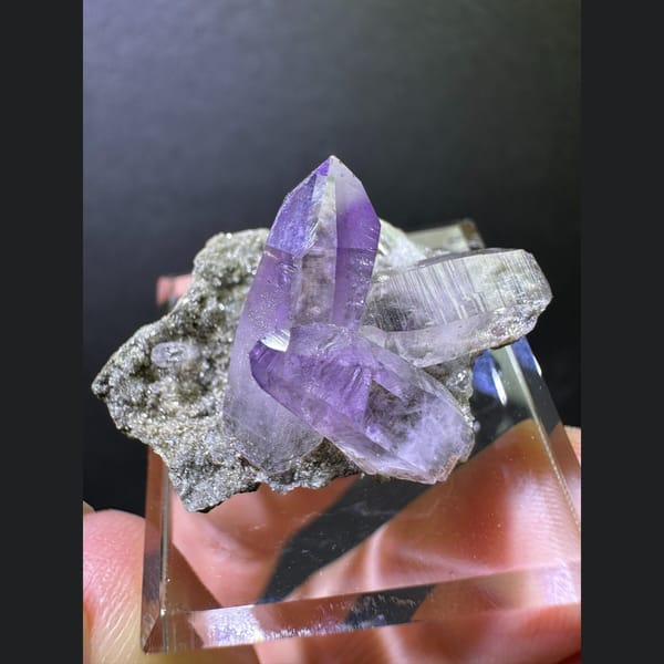 Clear Vera Cruz amethyst points on matrix from Mexico — complete view