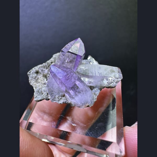 Clear Vera Cruz amethyst points on matrix from Mexico — alternate view