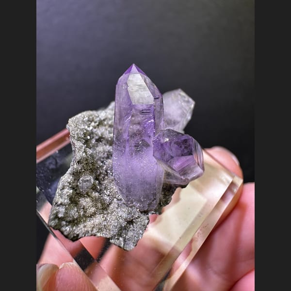 Clear Vera Cruz amethyst points on matrix from Mexico — alternate view