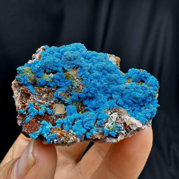 Complete front source-photo view of blue chrysocolla with fluorite