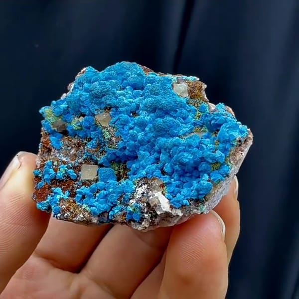 Complete side source-video view of the Moroccan chrysocolla specimen