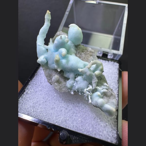 Pale blue coral-like aragonite on matrix from Yunnan — complete view