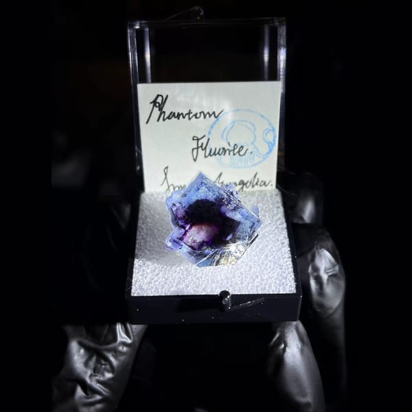 Clear fluorite with purple phantom and blue rim from Inner Mongolia — complete view