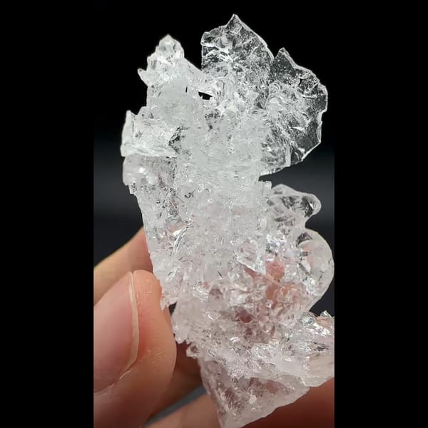 Water-clear etched pollucite crystal from Skardu, Pakistan — complete view