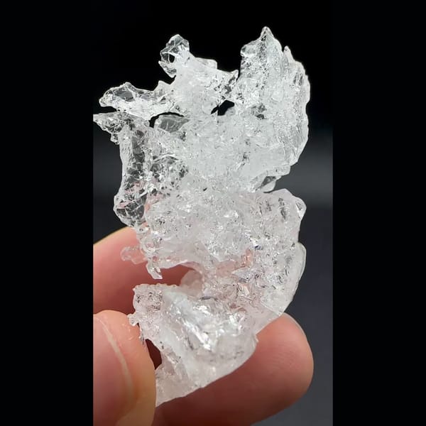 Water-clear etched pollucite crystal from Skardu, Pakistan — alternate view