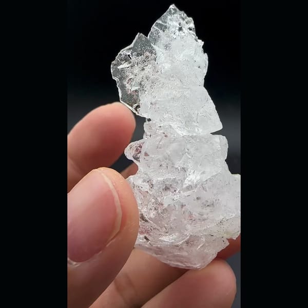 Water-clear etched pollucite crystal from Skardu, Pakistan — alternate view