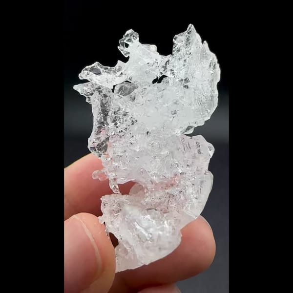 Water-clear etched pollucite crystal from Skardu, Pakistan — detail view