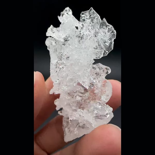 Water-clear etched pollucite crystal from Skardu, Pakistan — detail view