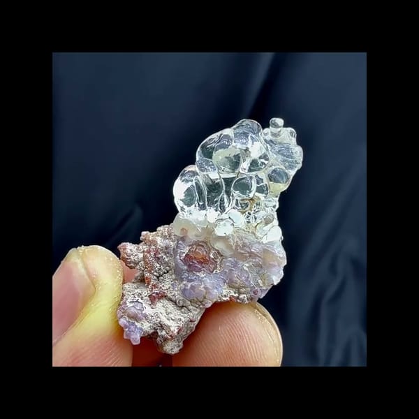 Complete front view of glassy botryoidal hyalite opal
