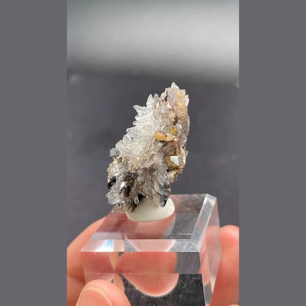 Gearksutite flower on matrix from Guizhou — detail view