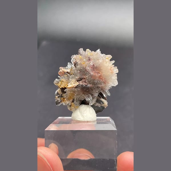 Gearksutite flower on matrix from Guizhou — detail view