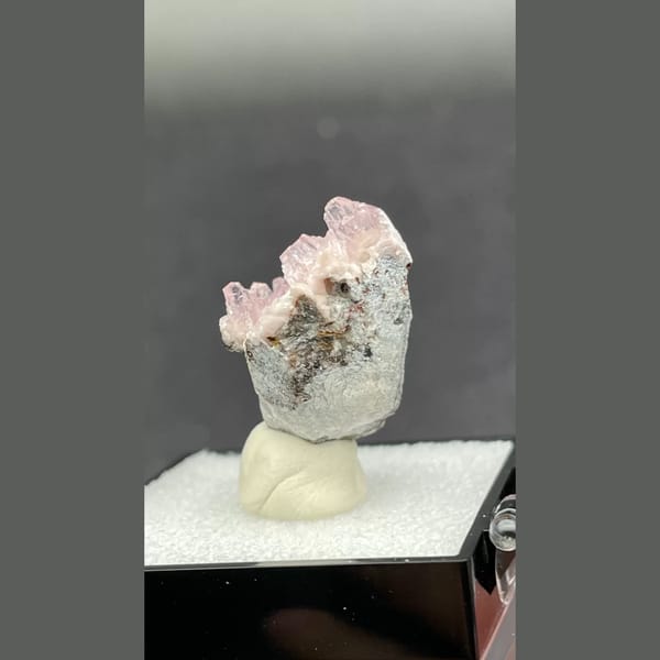 Rosy pink cobaltoan calcite on matrix from Morocco — detail view