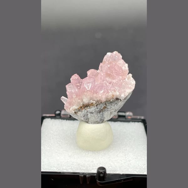 Rosy pink cobaltoan calcite on matrix from Morocco — detail view