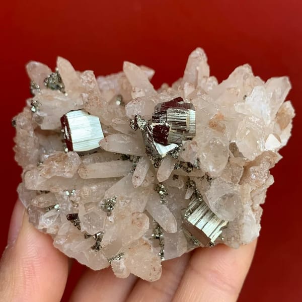 Close whole-product front view of striated pyrite cubes and quartz, Hubei