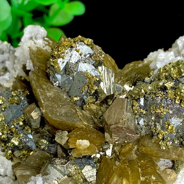 Chalcopyrite and tetrahedrite on golden siderite with white dolomite — detail view