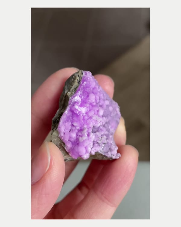 Complete reverse view of purple aragonite crystal cluster