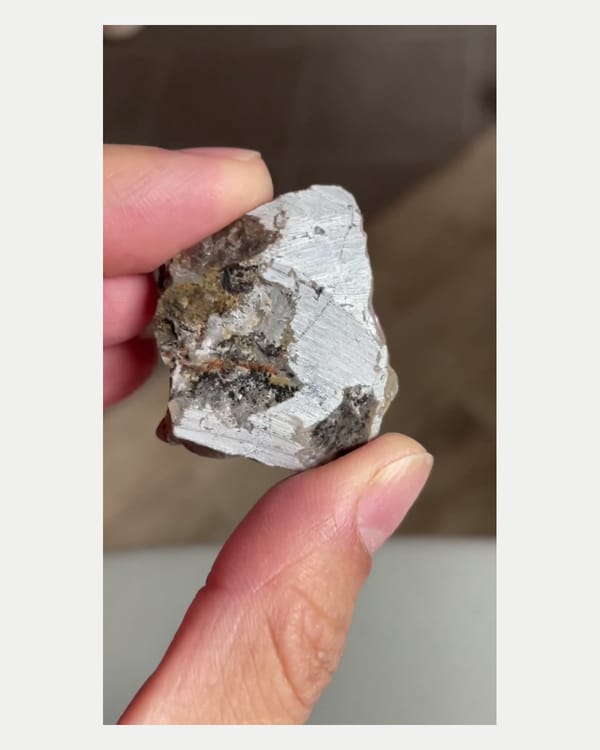 Complete right oblique view of purple aragonite crystal cluster