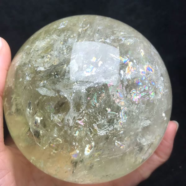 Pale yellow citrine quartz sphere with rainbows from Brazil — alternate view