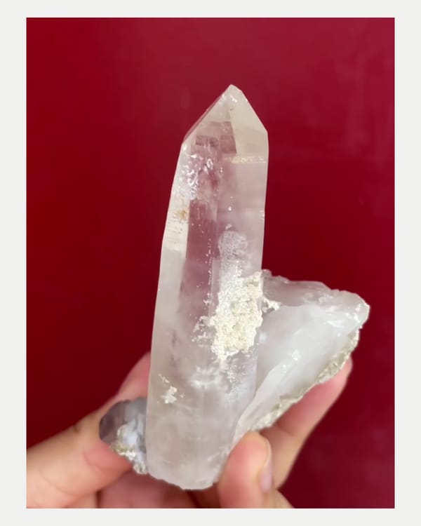 Complete reverse view of quartz point with pale fluorite