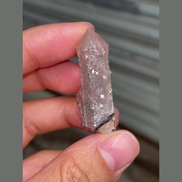 Large-head quartz with specular hematite from Inner Mongolia — detail view