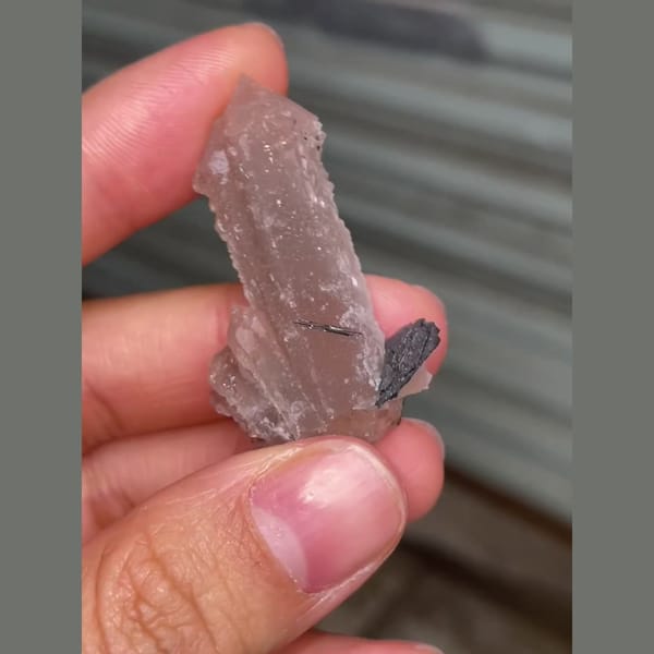 Large-head quartz with specular hematite from Inner Mongolia — detail view