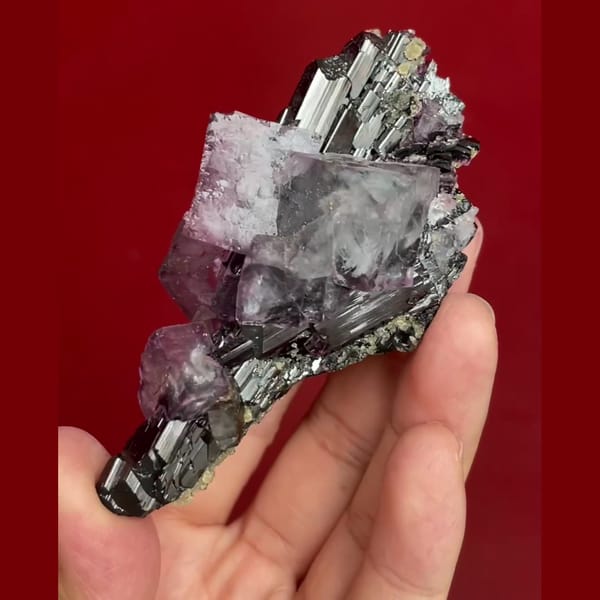 Yaogangxian wolframite with purple fluorite quartz mica — detail view