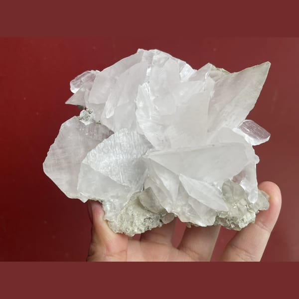 Large white bladed calcite cluster from Xianghualing, Hunan — alternate view