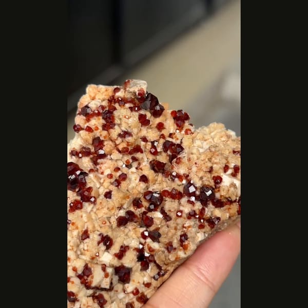 Wine-red garnet with feldspar from Yunxiao — alternate view
