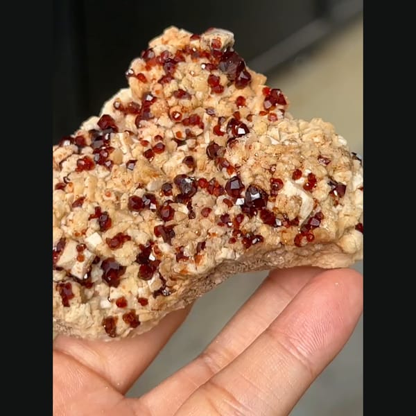 Wine-red garnet with feldspar from Yunxiao — detail view