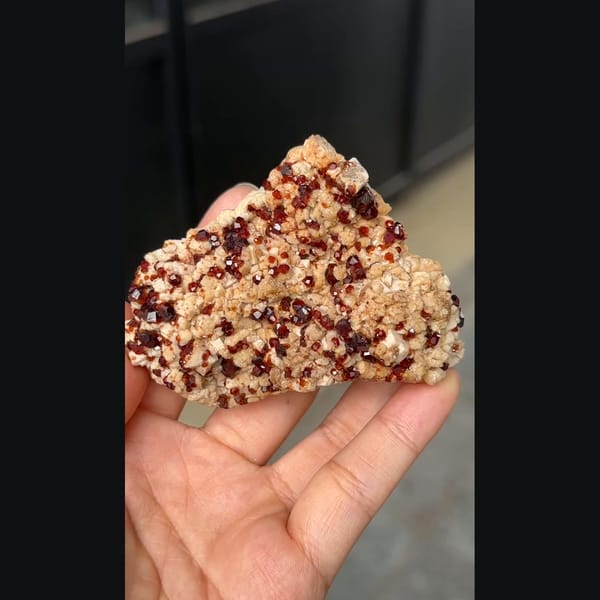 Wine-red garnet with feldspar from Yunxiao — detail view