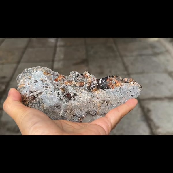 Wine-red gemmy sphalerite with calcite from Shuikoushan — detail view