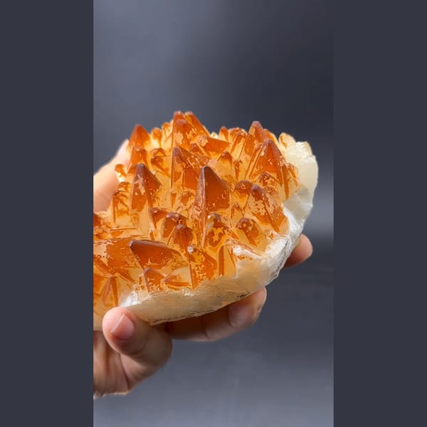 Golden orange calcite crystal cluster — alternate view