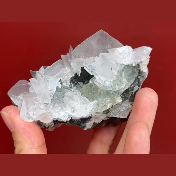 Pale green fluorite with white bladed calcite from Xianghuapu, Hunan — complete view