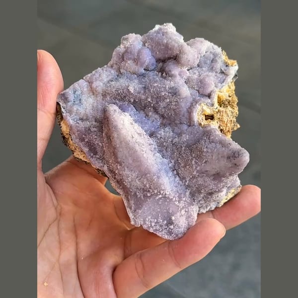 Lilac fluorite crust replacing calcite crystals from Qinglong, Guizhou — complete view