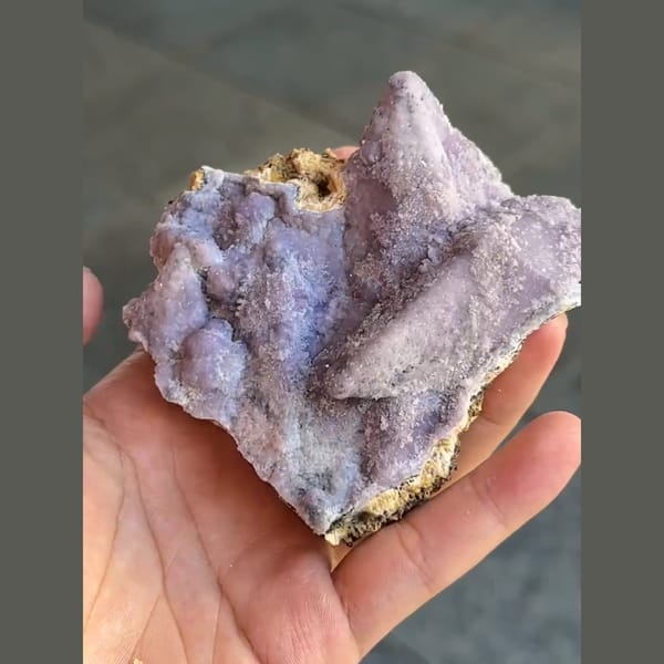 Lilac fluorite crust replacing calcite crystals from Qinglong, Guizhou — detail view