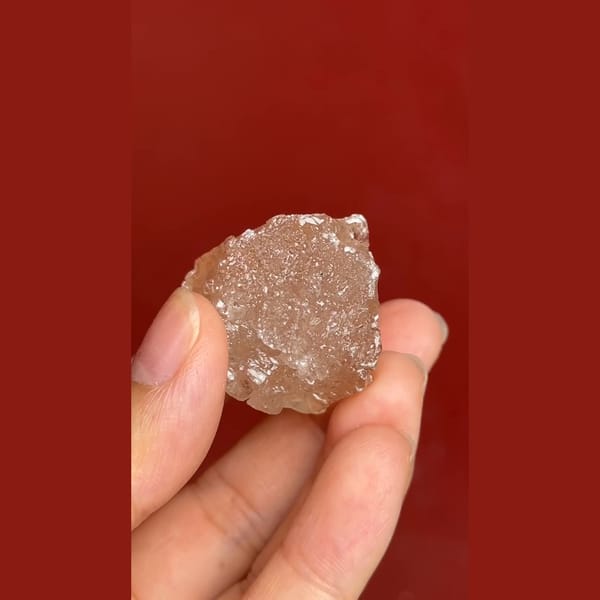 Pale champagne etched topaz crystal from Zhaotong, Yunnan — complete view