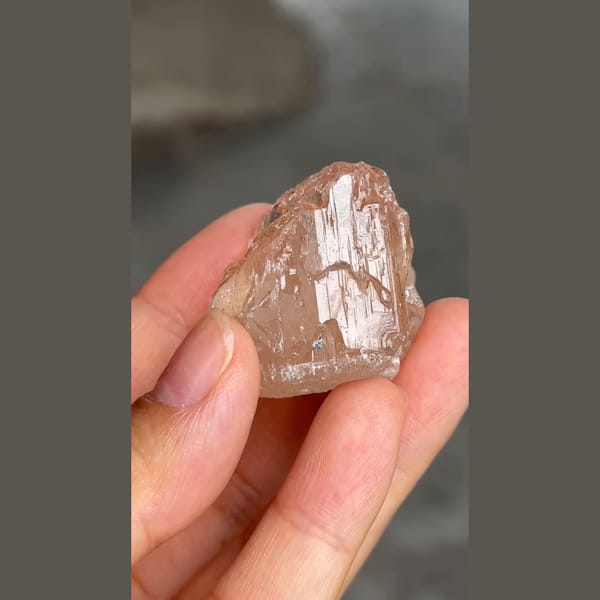 Pale champagne etched topaz crystal from Zhaotong, Yunnan — alternate view