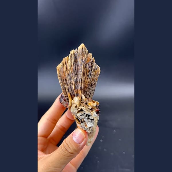 Stacked layered mica books with garnet and feldspar from Pakistan — alternate view