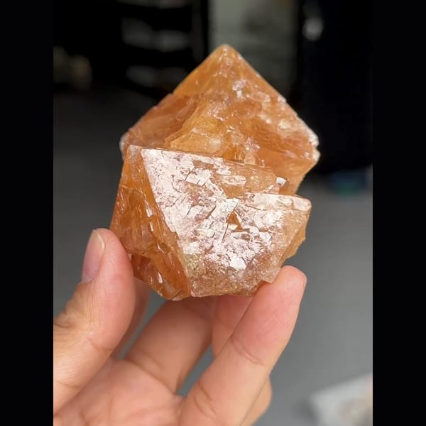 Large translucent orange scheelite crystal from Xuebaoding, Sichuan — complete view