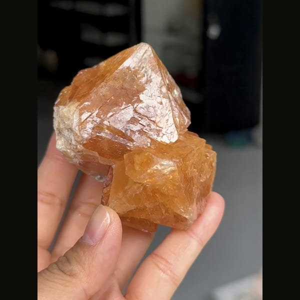 Large translucent orange scheelite crystal from Xuebaoding, Sichuan — alternate view